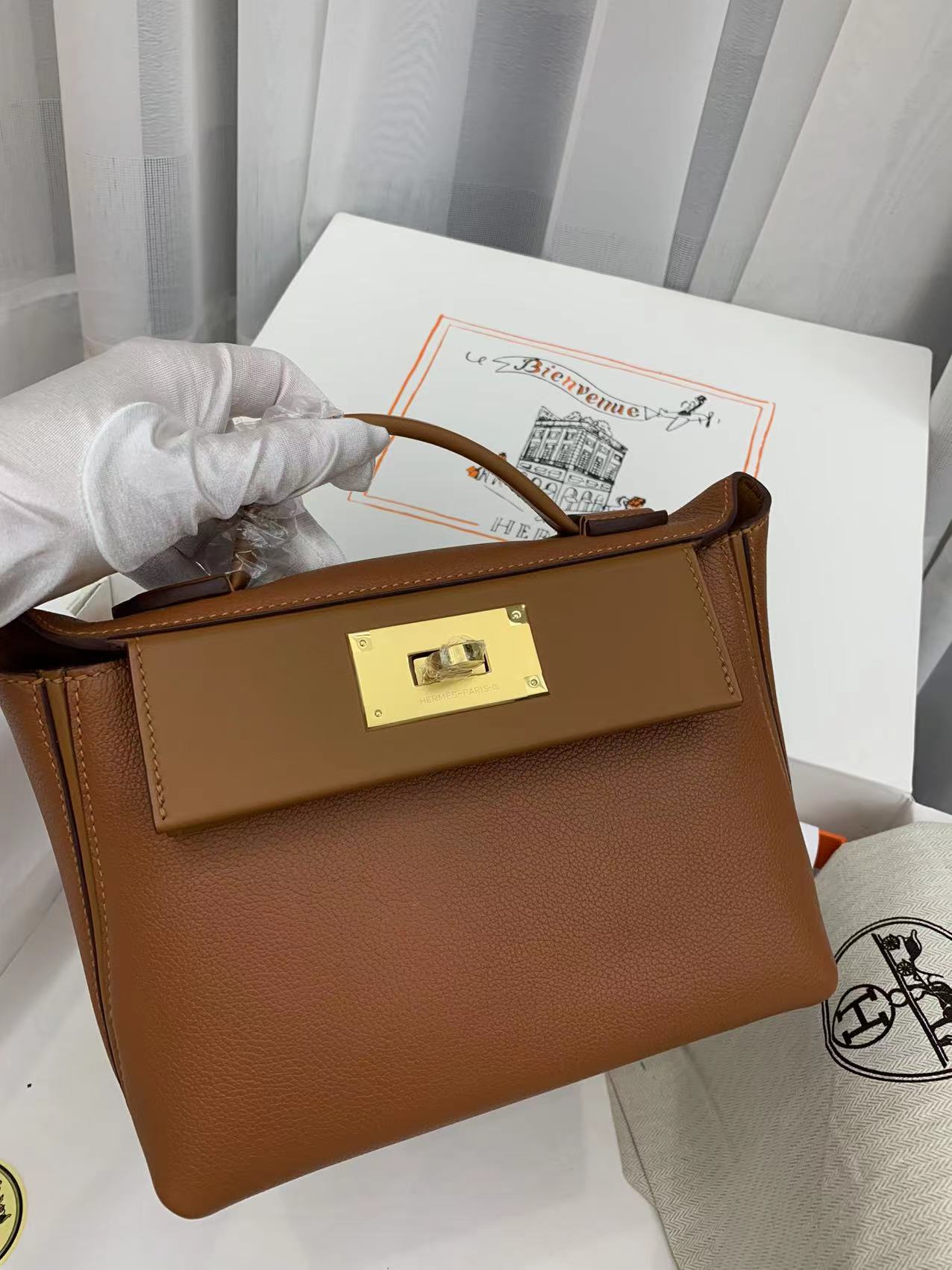 Hermes Kelly Mini 2424 21cm Handbag in Brown Clemence Leather 